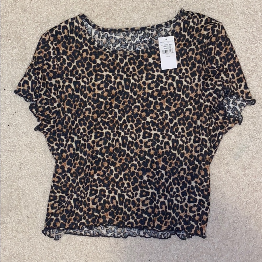 Leopard print short sleeve shirt.